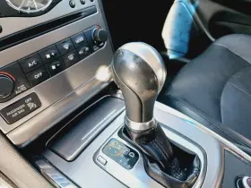 34910-jk03a Infiniti 896.in1o10 09-13 G37/g25 11-13 Qx56 A/t Shift Knob Black/g Oem