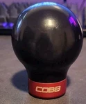 Shift Knob Round Delrin Black Cobb Logo Red Trim Fits Subaru 6-SPEED Each Used. Price: $70.00.
