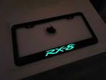 Glowing Mazda RX8 Stainless Steel License Plate Frame With Screws / Caps New. Price: $24.99.